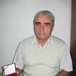 Nicolai Oprea cu medalia obţinută pentru monografia cartofilă “Bucovina - Cronică ilustrată”