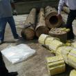 Ţigări de contrabandă aduse în România în bușteni scobiți